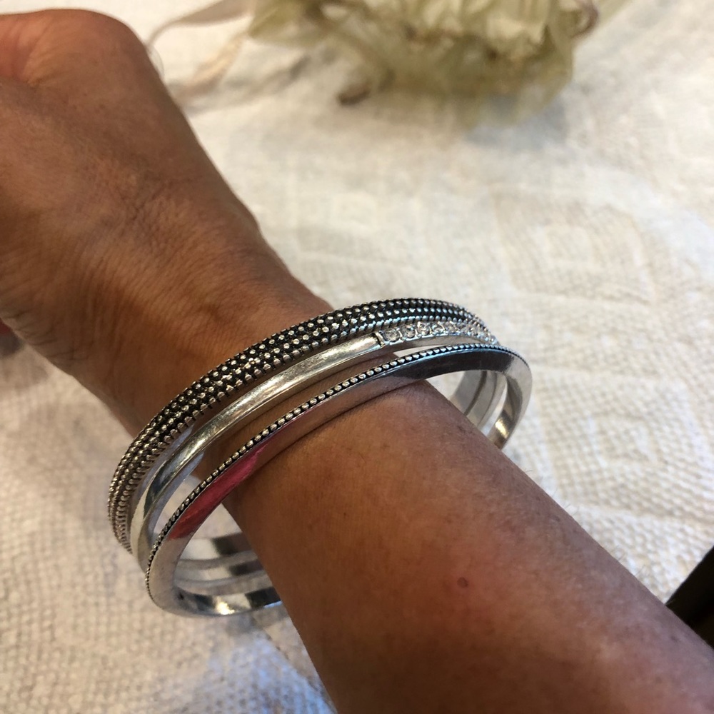 NWT silver style bangles Chico's with gift pouch. Fun ! Great gift